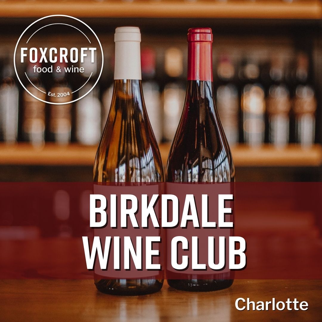 Two wine bottles on a bar with 'Foxcroft food & wine' and 'Birkdale Wine Club' text.