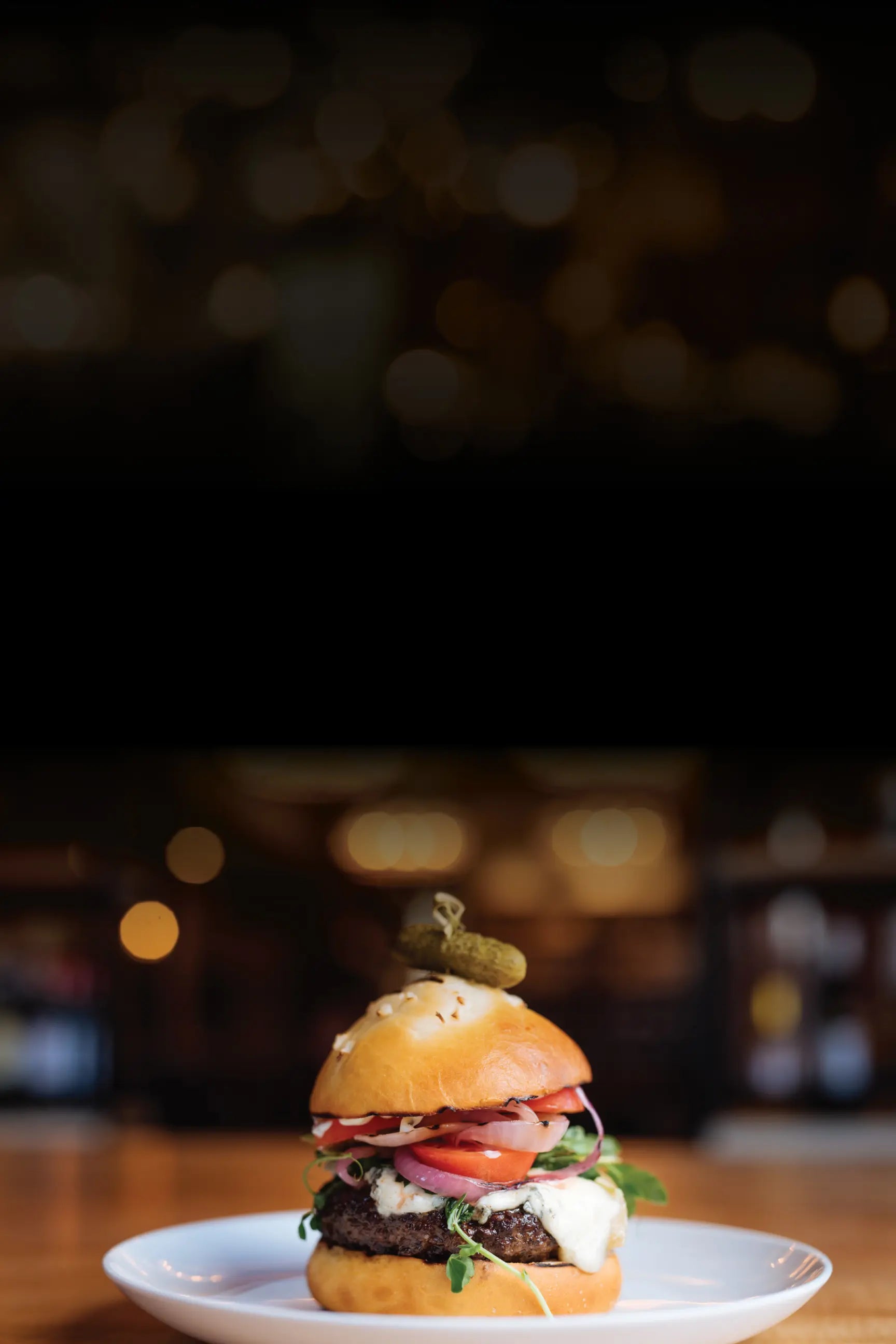 Delicious burger on a plate with a blurred background